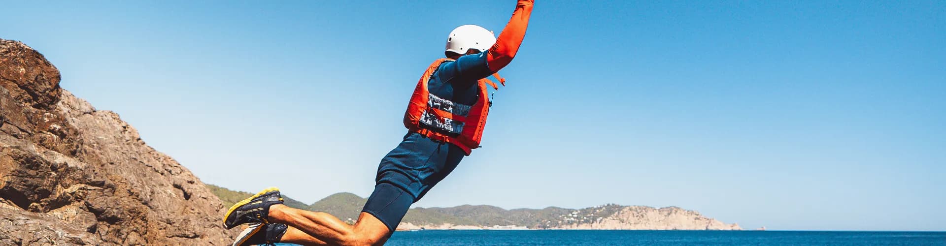 Launch into adventure with coasteering in Ibiza. Jump from natural rock formations along the island's stunning coastal cliffs. Guided tours with professional safety equipment included for an unforgettable Mediterranean experience.